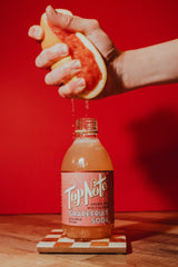 Sparkling Grapefruit Soda by Top Note Tonic Store