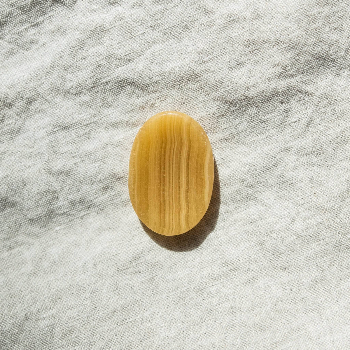 Yellow Calcite Worry Stone by Tiny Rituals