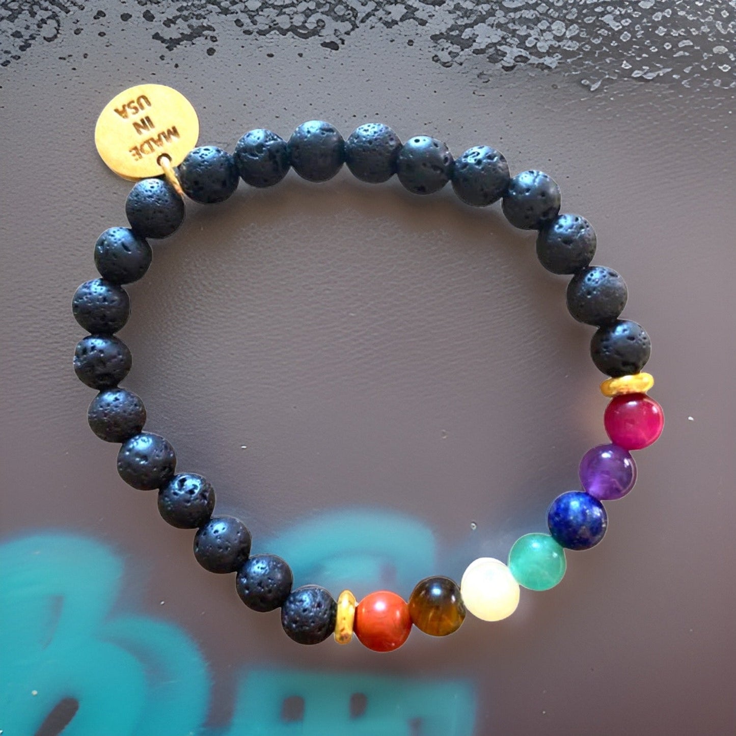 Small Black Lava Rock Chakra Bracelet by The Urban Charm