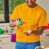 Man holding a jar of Cordyceps Mushroom Gummies, pouring gummies into his hand. Vegan and gluten-free, these gummies offer a natural energy boost.