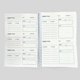 Interior pages of the Game Night Remembered journal designed for tracking board game details and results.