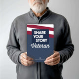 Veteran holding the 'Share Your Story Veteran' guided journal for U.S. veterans.