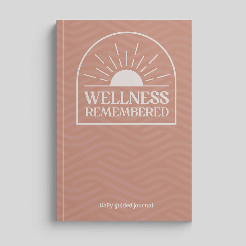 Wellness Remembered Mental Health Journal cover featuring sun design for daily mindfulness and self-improvement.
